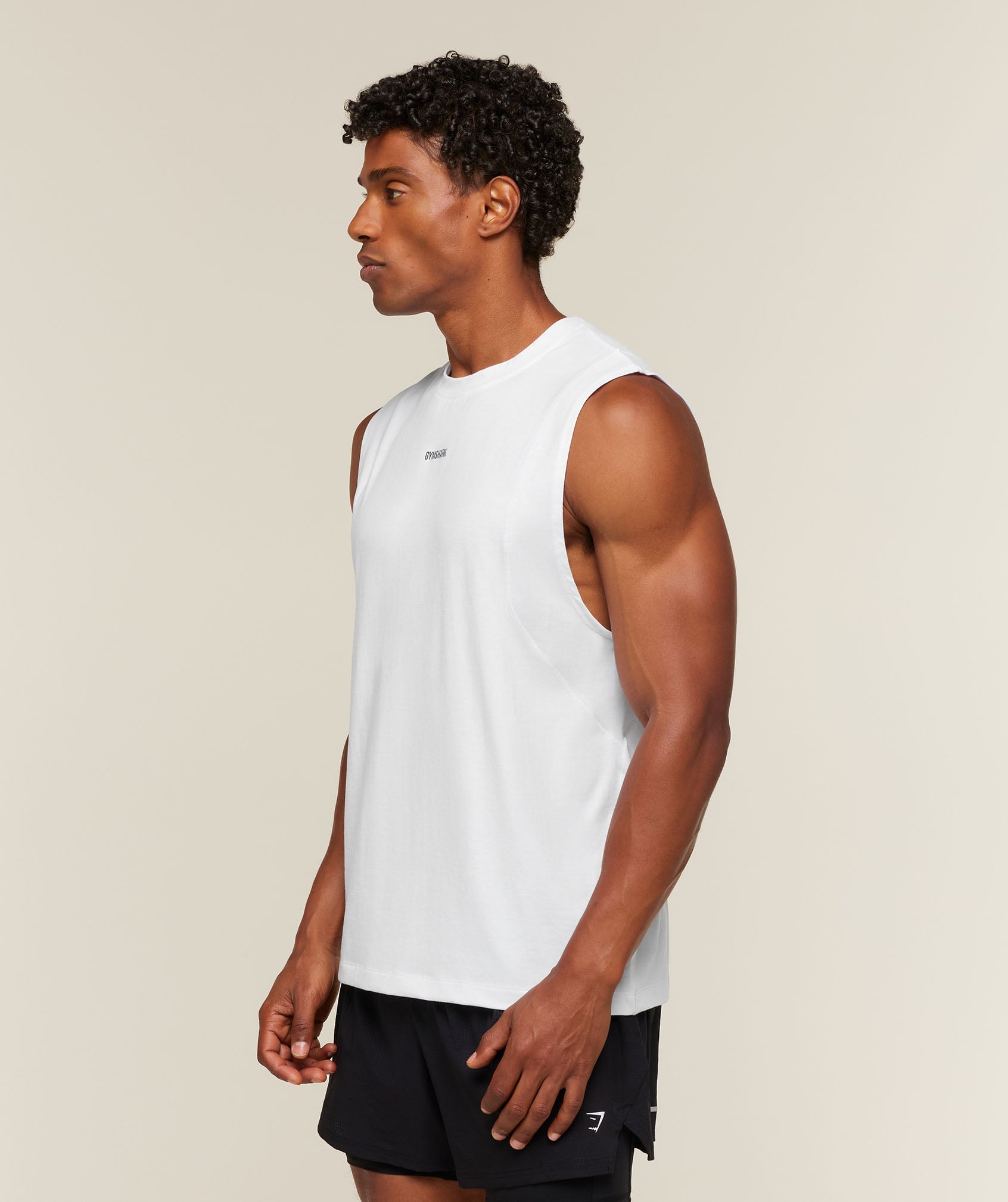 RunningSleevelessTopsNewGSWhiteA5C2V_WB57_1186_ef6e7e54-eed4-4869-a124-77821d934945.jpg Gymshark Running Boxy Tank White